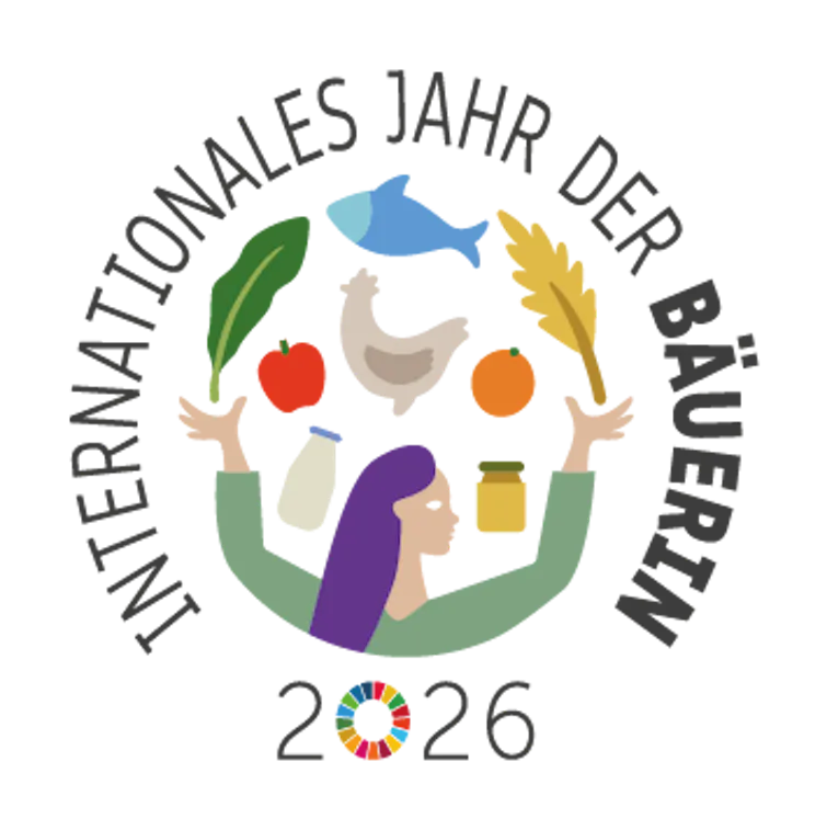 Logo Jahr der Bäuerin Das offizielle Logo "Jahr der Bäuerin", dass eine Frau zeigt, die beispielsweise Fisch, Fleisch, Milch und verschiedene Gemüse über sich ausgebreitet hat